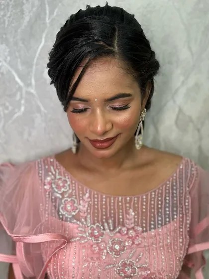 Another indoor shot, with eyes closed to show the full detail of the pink and brown shimmery eyeshadow.