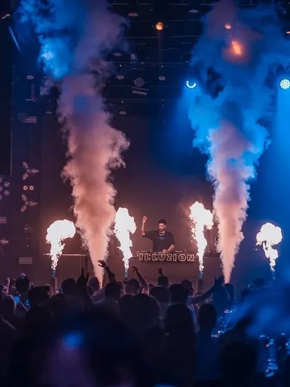 A wide shot of the stage at Illuzions Hyderabad, complete with pyro and CO2 jets. I work with venues to create a full-scale production for every show.