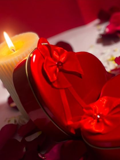 Another look at my Valentine's Day gift box, a red heart shaped tin filled with chocolates and a teddy. It's an affordable and charming gift for the season of love.