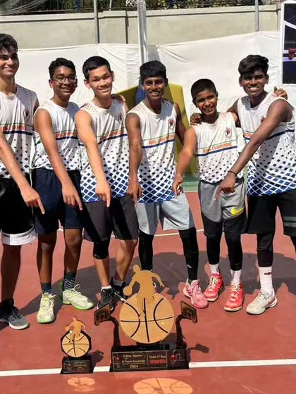The U17 champions pointing to their hard-earned tournament trophy. We love seeing the pride and joy on the faces of our winning teams.