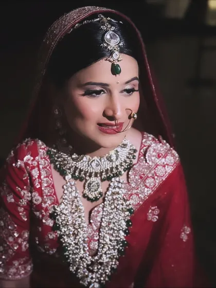 A classic bridal portrait. Her makeup is set for a long day, with a focus on a crease-proof base and eyes that stand out beautifully.