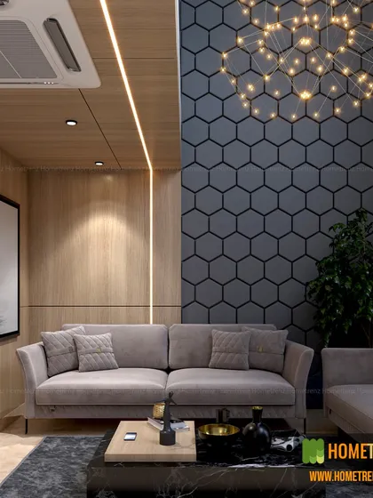 Every corner should tell a story. This living area combines a wood-paneled wall with a striking hexagonal tile accent, illuminated by a modern constellation chandelier, making the space unique and comfortable.