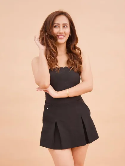 A candid moment from the Choco Chic photoshoot. This look is radiant, chic, and savage at heart, proving that brunette hair is anything but boring.