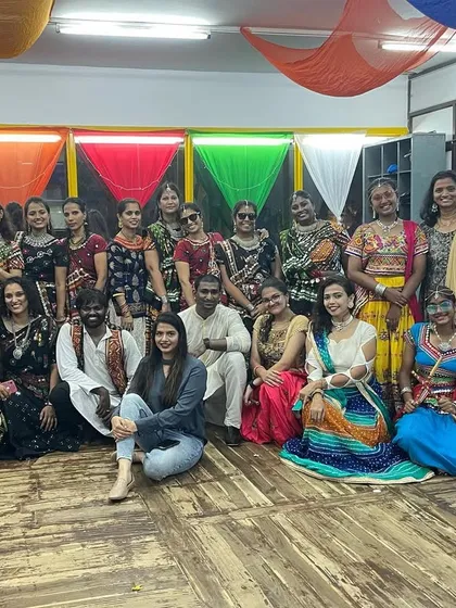 A smaller group photo from the Dandiya event, showcasing the beautiful traditional outfits.