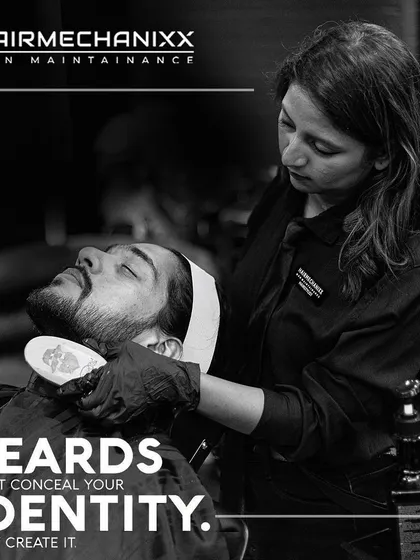Your beard doesn't conceal your identity, it creates it. Here, our skilled lady barber is performing a premium beard service, proving that expert grooming is an art form.