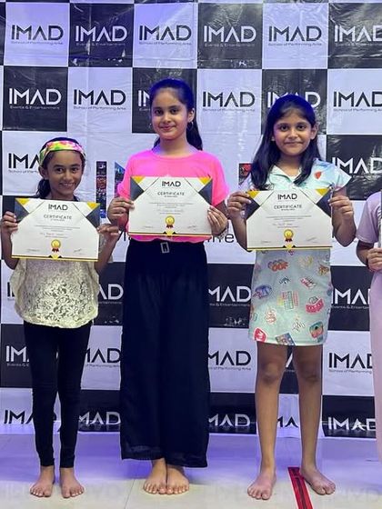 Proudly holding their certificates of participation for the Tarulya 2023 show.