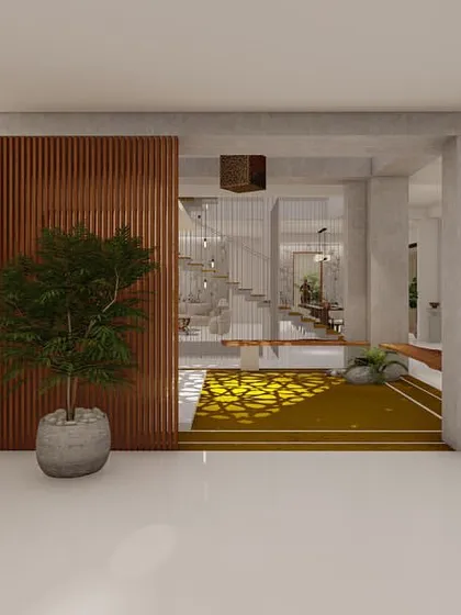 The entrance foyer of this home introduces our design language, with a tree-of-life wall sculpture and a clear view into the central courtyard, immediately establishing a connection with nature.