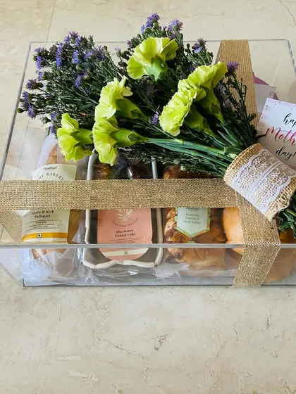 Another version of our Mother's Day breakfast tray, this one filled with an assortment of pastries from The Bakery and a beautiful bouquet.