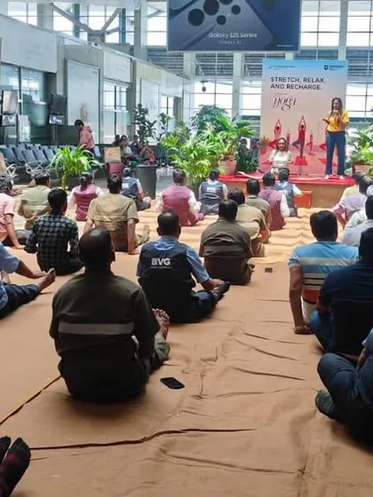 Another angle of the yoga session at Mumbai Airport, showing the staff deeply engaged in the practice. It proves that a peaceful mind can be cultivated anywhere.