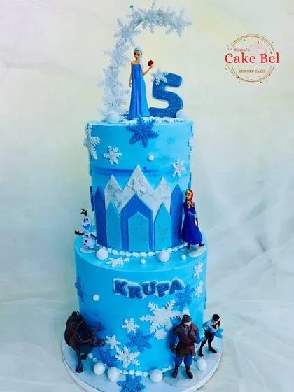 Another shot of the two-tier Frozen cake under my official logo.