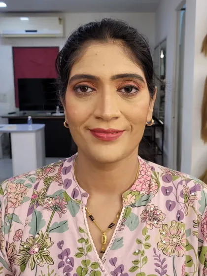 Another angle of the corrective makeup look, showing how the techniques create a smooth and balanced complexion while still looking natural and radiant.