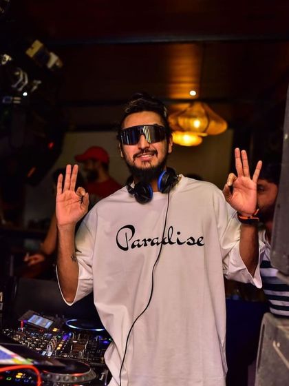 A cool and confident pose in my 'Paradise' shirt. That's what I aim to create on the dance floor.