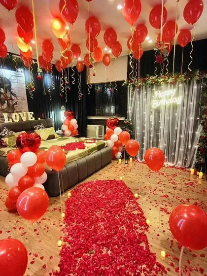 Another shot of the dramatic red-themed room, perfect for making a grand romantic gesture for a birthday or anniversary.