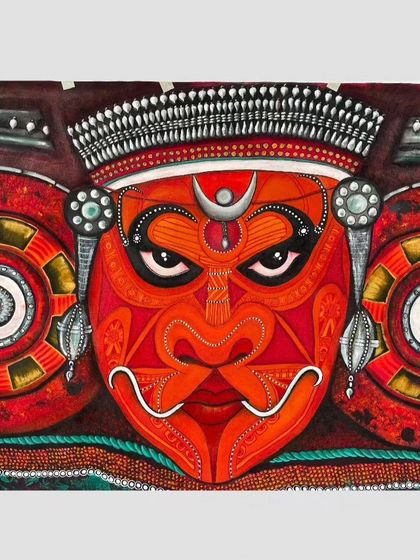A high-quality, straight-on shot of the completed Theyyam face mural. The intricate dot work and line details are clearly visible.