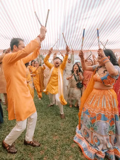 The energy during this Dandiya carnival was unmatched. I love seeing guests completely immersed in the celebration, creating beautiful, candid moments like this.