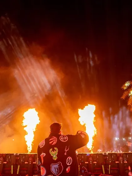 Bringing the heat, literally. A live performance isn't just about the music; it's a full sensory show with fire, lights, and non-stop energy.