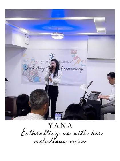 Our student Yana enthralling the audience at our first anniversary celebration. Our events are a platform for students to share their talent with our community.