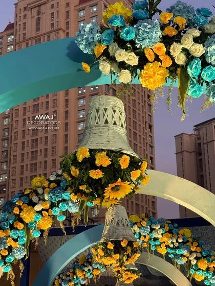 A close-up of the hanging floral bells, a unique and traditional detail that adds charm to the Haldi decor.