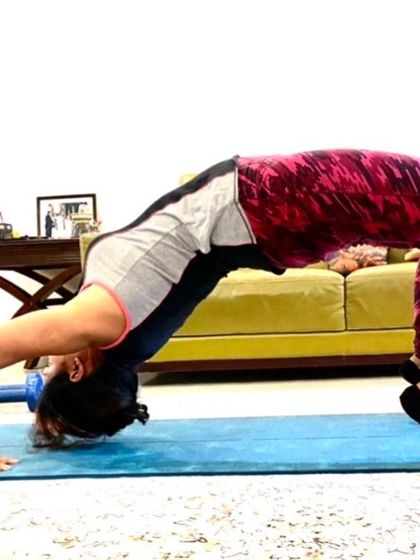 The Chakrasana, or Wheel Pose, is a powerful yoga asana. It builds upper body strength, improves spine flexibility, and as an inversion, it aids blood flow to the brain. I incorporate strengthening asanas like this into my yoga practice for maximum benefit.