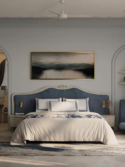 This master bedroom concept blends classical charm with a serene, modern aesthetic. The soft powder blue tones, elegant arches, and a custom-carved headboard come together to create a peaceful sanctuary that feels both luxurious and deeply personal.