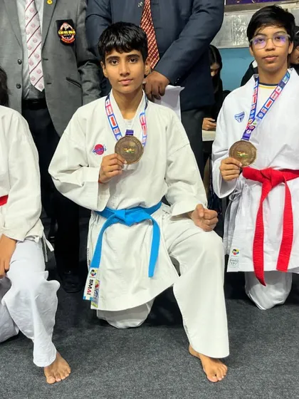 Our young female champions with their medals. It is incredibly rewarding to see the next generation of karateka showing such skill and determination.