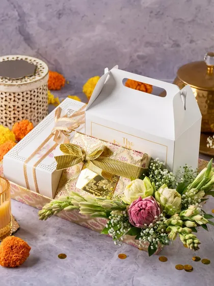This Diwali tray combines our assorted dessert boxes with fresh tuberoses for a beautiful and fragrant gift.