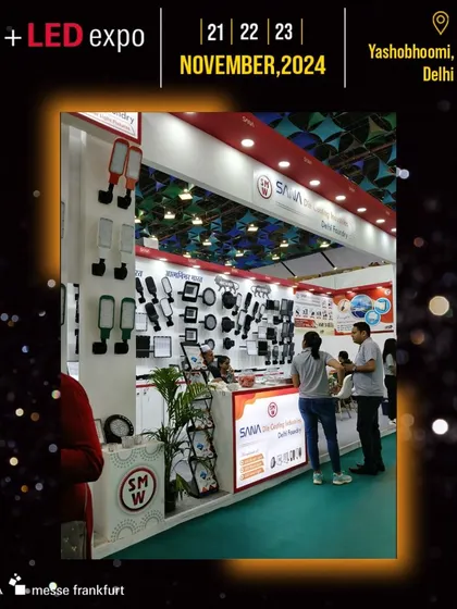 The SANA Lighting Industries booth displays a wide variety of wall-mounted fixtures and other lighting components.