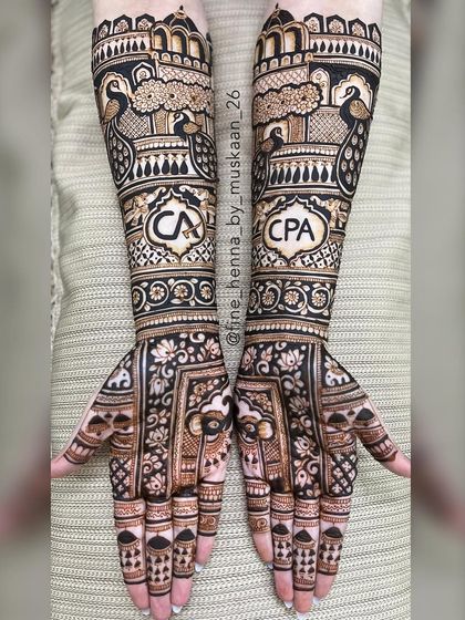 A special request from a bride who is a Chartered Accountant. We incorporated the 'CA' logo into her traditional bridal mehndi, celebrating her personal achievements.