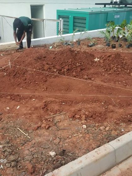 More site work in progress, showing the careful marking and shaping of the earth. Every project is a hands-on process of translating our ecological and design principles into a physical form.