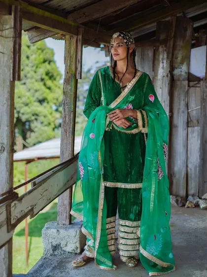 A full-length shot for Baavli, showcasing a traditional Pahari-inspired outfit against the backdrop of the Mussoorie hills.