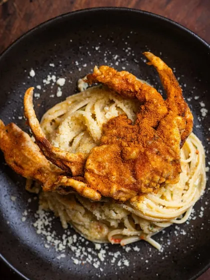 An Italian classic meets coastal indulgence. My Soft Shell Crab Aglio e Olio is a unique creation, with perfectly cooked spaghetti tossed in garlic and oil, topped with a crispy, flavorful crab.
