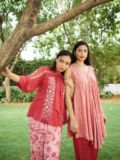 This extensive collection features a wide array of modern festive attire. From vibrant sharara sets and elegant anarkalis to chic jumpsuits and light lehengas, these pieces are curated for wedding guests and anyone looking for a stylish outfit for a special occasion.