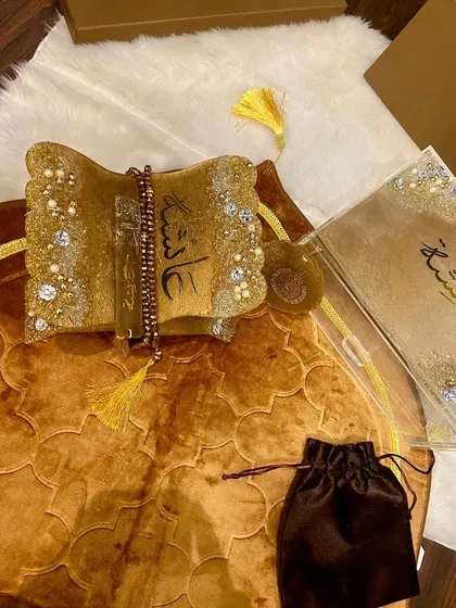 This is an example of my premium gift sets, perfect for weddings or Ramadan. This set includes a personalized Quran box and holder, a crystal tasbih, and a matching bookmark, all unified with a luxurious gold and white resin design.