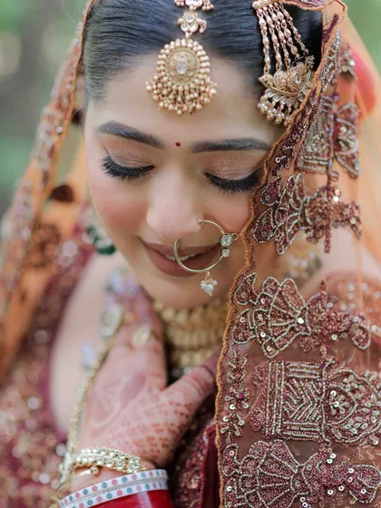 A close-up of a soft glam Sikh bridal look. Notice the gentle shimmer on the eyes and the perfectly blended skin that looks flawless even in natural light. For an Anand Karaj, I believe in creating an aura of grace and serenity.