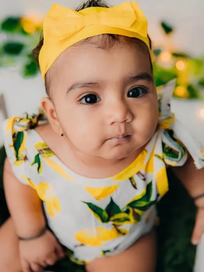 The amazing lemonade girl. Her curious expression is just adorable in this close-up shot.