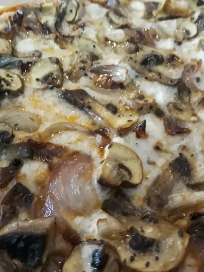 Another angle of the mushroom pizza, highlighting the rich toppings and the perfectly baked gluten-free crust. This is a go-to recipe in my comfort food workshops.