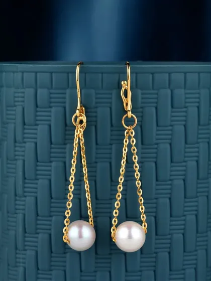 Indulge in the allure of luxury with these captivating pearl drop earrings. The simple, elegant design with a gold chain allows the natural pearl to be the star, offering a touch of classic sophistication.
