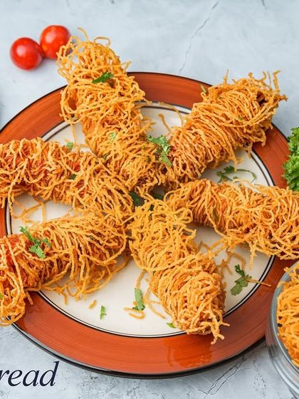 Our Crispy Thread chicken features chicken wrapped in thin, crispy noodles and fried until golden brown. This gives it an amazing crunch and a unique texture.