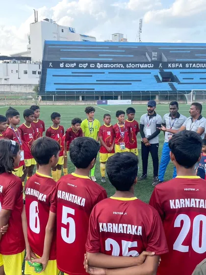 A key part of my service is communication. Here, I am talking with the youth team during a break, providing guidance on injury prevention and ensuring they are physically prepared for the game ahead.