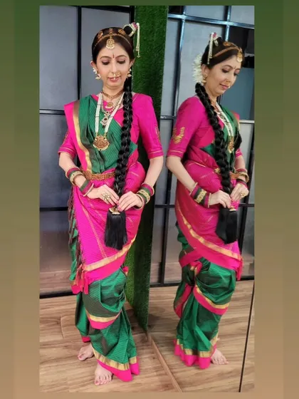 A front and back view of the Iyer style Madisar drape. This shows the unique bifurcated style and the neatly arranged pleats, which are hallmarks of this traditional look.
