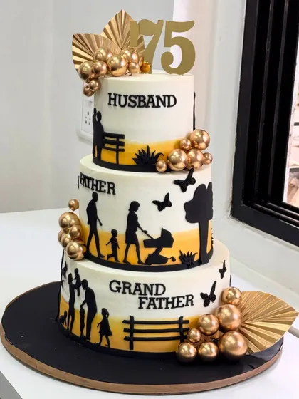 A cake that tells a lifetime's story. Each tier of this 75th birthday cake represents a cherished role: Husband, Father, and Grandfather, celebrating a beautiful legacy of family and love.