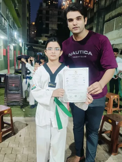Congratulations to this student on earning her green belt. She has consistently shown focus and a great attitude in her training.