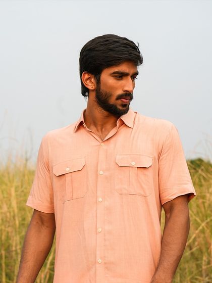This camel-inspired utility shirt is versatile enough for any occasion, from a casual brunch to a getaway with friends. Crafted from eco-friendly fabric, it combines functionality with a simple, elegant style.