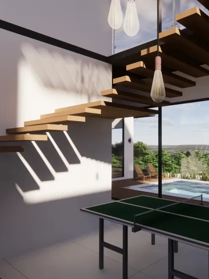 The interior of the Snow Villa features this floating staircase, a key architectural element that enhances the sense of openness. This design detail connects the living area to the upper floor while maintaining clear sightlines to the pool and landscape outside.