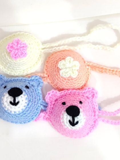 My funkiest creation yet, crochet nose warmers. I made these on a custom request in cute bear and flower designs.