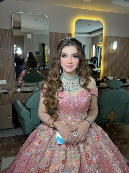 This client looks like a princess in her beautiful pink gown. We gave her a glamorous look with dramatic eyes and glowing skin.