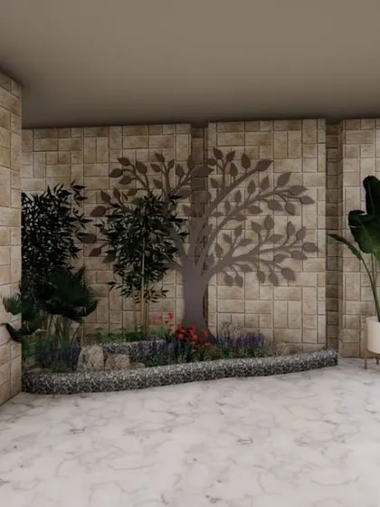 This courtyard design features a beautiful mosaic of a tree on a stone-clad wall. It serves as a timeless piece of art that grounds the space and connects it to nature.