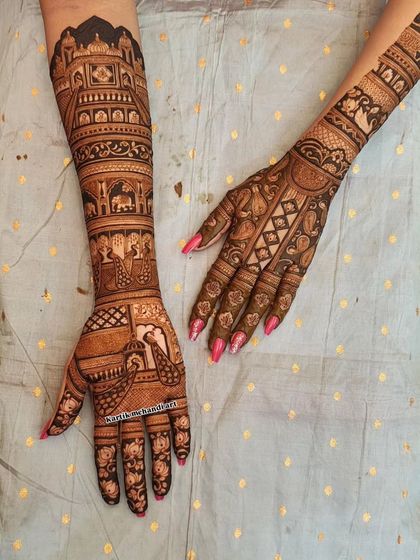 We combine different styles in a single bridal piece, with one arm featuring traditional Rajasthani architecture and the other showcasing bold, geometric patterns.