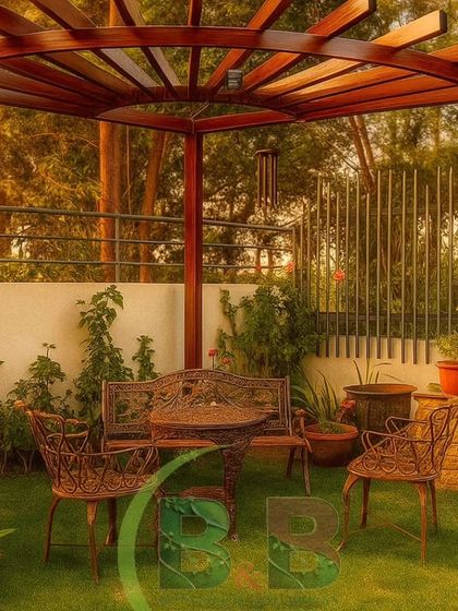 A perfect corner for quiet afternoons. We designed this tranquil garden space in Bannerghatta with a lush lawn, classic wrought-iron seating, and a custom-built wooden pergola that provides dappled sunlight, creating an idyllic and timeless retreat.