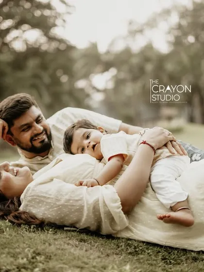 You don't need to know how to pose. Just lie in the grass, cuddle your baby, and be yourselves. I will find the magic in your real, unfiltered connection and turn it into a beautiful memory.